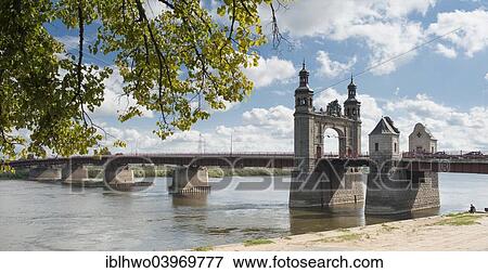"Queen Louise Bridge, 1907, only the southern bridge portal remaining after a sustained explosion during World War II, steel girder bridge from the 1960s, the border crossing into Lithuania, Tilsit, Sovetsk, Kaliningrad Oblast, Russia, Europe" View Large Photo Image Stock Photo - "Queen Louise Bridge, 1907, only the southern bridge portal remaining after a sustained explosion during World War II, steel girder bridge from the 1960s, the border crossing into Lithuania, Tilsit, Sovetsk, Kaliningrad Oblast, Russia, Europe". Fotosearch