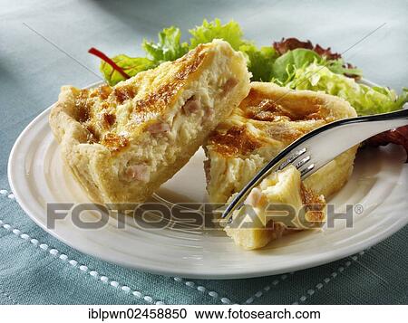 Stock Image - Quiche Lorraine slices. Fotosearch