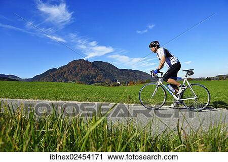 "Racing cyclist, Ruhpolding, Chiemgau region, Upper Bavaria, Bavaria, Germany, Europe" View Large Photo Image Stock Image - "Racing cyclist, Ruhpolding, Chiemgau region, Upper Bavaria, Bavaria, Germany, Europe". Fotosearch
