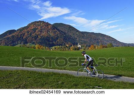 "Racing cyclist, Ruhpolding, Chiemgau region, Upper Bavaria, Bavaria, Germany, Europe" View Large Photo Image Stock Photo - "Racing cyclist, Ruhpolding, Chiemgau region, Upper Bavaria, Bavaria, Germany, Europe". Fotosearch
