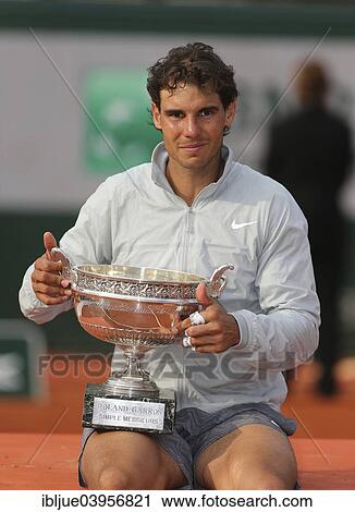 "Rafael Nadal, ESP, holding the trophy after winning the Men's Final, 2014 French Open, Roland Garros, Paris, France, Europe" View Large Photo Image Stock Image - "Rafael Nadal, ESP, holding the trophy after winning the Men's Final, 2014 French Open, Roland Garros, Paris, France, Europe". Fotosearch