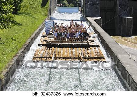 Stock Photograph - "Rafting on the Isar River, Muehltal raft slide, the largest raft slide in Europe, Upper Bavaria, Bavaria, Germany, Europe". Fotosearch
