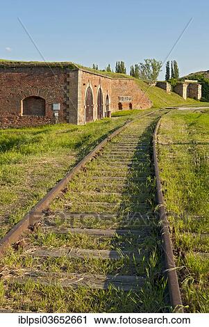 Stock Image - "Rail track near the funeral rooms, Terezin Memorial, Terezin, Usti nad Labem Region, Czech Republic, Europe". Fotosearch