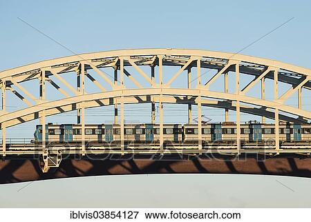 "Railway bridge and commuter train, Stockholm, Sweden, Europe" View Large Photo Image Stock Photo - "Railway bridge and commuter train, Stockholm, Sweden, Europe". Fotosearch