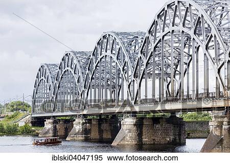 "Railway bridge, Dzelzceļa tilts, over the Daugava river or Western Dvina, Riga, Latvia, Europe" View Large Photo Image Stock Photography - "Railway bridge, Dzelzceļa tilts, over the Daugava river or Western Dvina, Riga, Latvia, Europe". Fotosearch