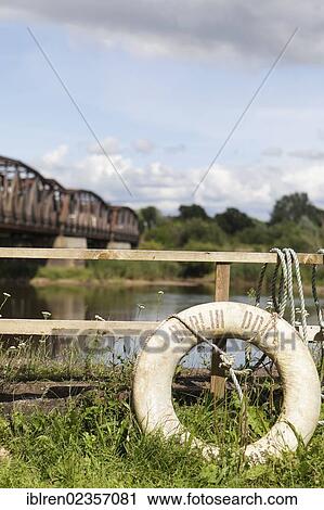 "Railway bridge over the border river Oder, Polish-German border, Kuestrin to Kostrzyn, life buoy with the inscription """"Berlin DDR"""", Brandenburg, Germany, Europe" View Large Photo Image Stock Image - "Railway bridge over the border river Oder, Polish-German border, Kuestrin to Kostrzyn, life buoy with the inscription """"Berlin DDR"""", Brandenburg, Germany, Europe". Fotosearch
