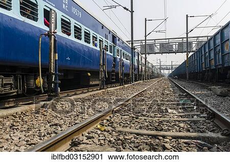 "Railway track and two trains at the railway station, Allahabad, Uttar Pradesh, India, Asia" View Large Photo Image Stock Image - "Railway track and two trains at the railway station, Allahabad, Uttar Pradesh, India, Asia". Fotosearch