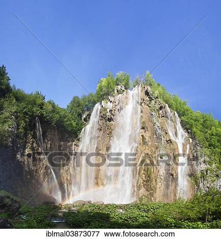 Stock Photo - "Rainbow at a waterfall, Large Waterfall, Veliki Slap, Plitvice Lakes National Park, UNESCO World Heritage Site, Croatia, Europe". Fotosearch