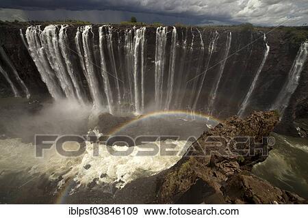 "Rainbow at Rainbow Falls, Victoria Falls, Zimbabwe, Africa" View Large Photo Image Stock Photo - "Rainbow at Rainbow Falls, Victoria Falls, Zimbabwe, Africa". Fotosearch