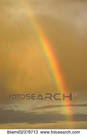 Stock Image - "Rainbow during a thunderstorm, Goblin Valley State Park, San Rafael Reef Desert, Utah, Southwestern USA, USA". Fotosearch