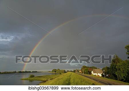 "Rainbow over the Elbe River, Rosenweide, Lower Saxony, Germany, Europe" View Large Photo Image Stock Photo - "Rainbow over the Elbe River, Rosenweide, Lower Saxony, Germany, Europe". Fotosearch
