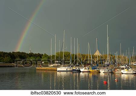 Stock Image - "Rainbow over the Pirita marina, Tallinn, Estonia, Baltic States, Europe". Fotosearch