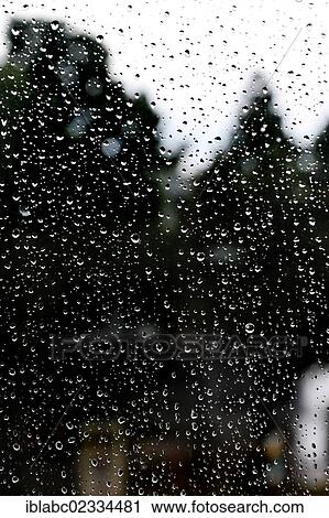"Raindrops on a window pane, Germany, Europe" View Large Photo Image Stock Image - "Raindrops on a window pane, Germany, Europe". Fotosearch