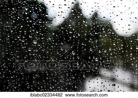 "Raindrops on a window pane, Germany, Europe" View Large Photo Image Stock Image - "Raindrops on a window pane, Germany, Europe". Fotosearch