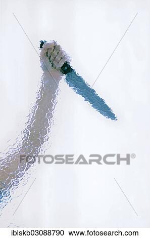 Raised hand holding a large butcher's knife behind cathedral glass View Large Photo Image Stock Image - Raised hand holding a large butcher's knife behind cathedral glass. Fotosearch
