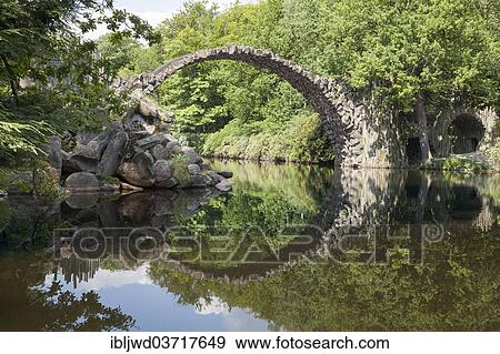 Stock Photo - "Rakotz bridge, Azaleen- und Rhododendronpark Kromlau, Kromlau, Saxony, Germany, Europe". Fotosearch