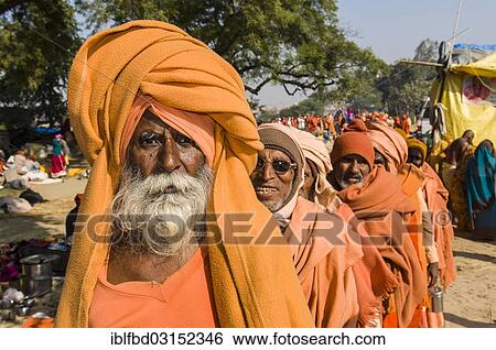 Stock Photograph - "Rama sadhu, holy man, at the Sangam, the confluence of the rivers Ganges, Yamuna and Saraswati, during Kumbha Mela festival, Allahabad, Uttar Pradesh, India, Asia". Fotosearch