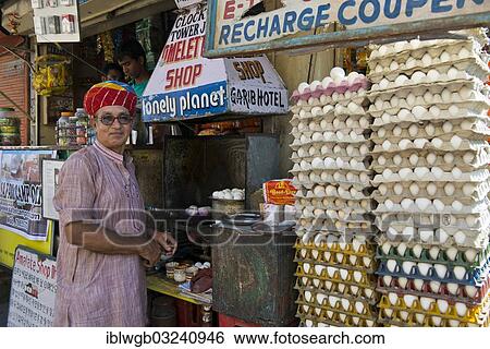 Stock Photograph - "Ramkishan Gawlani, known as The Omelette Man of Jodhpur, standing at his omelette stall, Jodhpur, Rajasthan, India, Asia". Fotosearch
