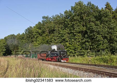 "Rasender Roland"""" steam train, Garftitz station, Ruegen Island, Mecklenburg-Western Pomerania, Germany, Europe" View Large Photo Image Stock Image - "Rasender Roland"""" steam train, Garftitz station, Ruegen Island, Mecklenburg-Western Pomerania, Germany, Europe". Fotosearch