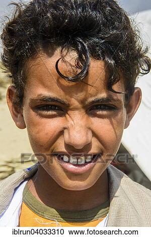 "Rashaida boy in the desert around Massaua, Eritrea, Africa" View Large Photo Image Stock Image - "Rashaida boy in the desert around Massaua, Eritrea, Africa". Fotosearch