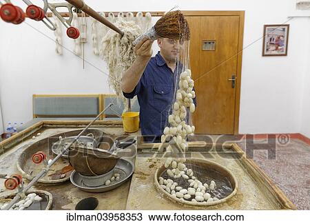 Stock Image - "Raw silk and silk cocoons, Sentez carpet weavery, Avanos, Nevsehir Province, Cappadocia, Central Anatolia Region, Anatolia, Turkey, Asia". Fotosearch