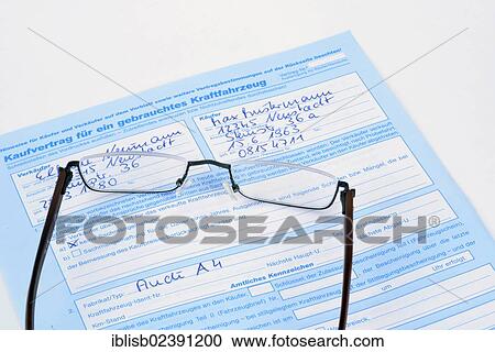 Reading glasses lying on a German purchase agreement View Large Photo Image Stock Image - Reading glasses lying on a German purchase agreement. Fotosearch