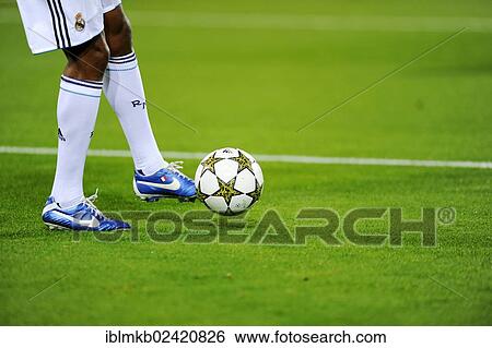 Stock Photograph - Real Madrid player running after the official match ball, Adidas Champions League Final 2013, Borussia Dortmund - Real Madrid, Dortmund, North Rhine-Westphalia, Germany, Europe. Fotosearch