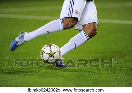 Real Madrid player running after the official match ball, Adidas Champions League Final 2013, Borussia Dortmund - Real Madrid, Dortmund, North Rhine-Westphalia, Germany, Europe View Large Photo Image Stock Photography - Real Madrid player running after the official match ball, Adidas Champions League Final 2013, Borussia Dortmund - Real Madrid, Dortmund, North Rhine-Westphalia, Germany, Europe. Fotosearch