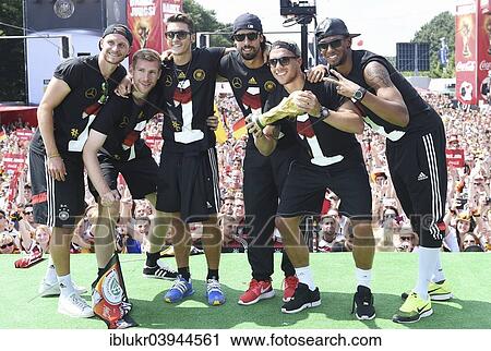 Stock Image - "Reception of the German national team after their victory at the FIFA World Cup 2014, fan party at the Brandenburg Gate, Berlin, Germany, Europe". Fotosearch