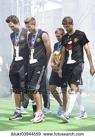 "Reception of the German national team after their victory at the FIFA World Cup 2014, fan party at the Brandenburg Gate, Berlin, Germany, Europe" View Large Photo Image Stock Photo - "Reception of the German national team after their victory at the FIFA World Cup 2014, fan party at the Brandenburg Gate, Berlin, Germany, Europe". Fotosearch
