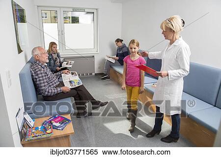 "Receptionist calling for the next patient in the waiting room of a dental office, Germany, Europe" View Large Photo Image Stock Photography - "Receptionist calling for the next patient in the waiting room of a dental office, Germany, Europe". Fotosearch