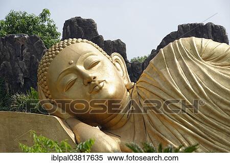 Stock Photography - "Reclining Buddha, Maha Vihara Mojopahit, Mojokerto, Java, Indonesia, Asia". Fotosearch
