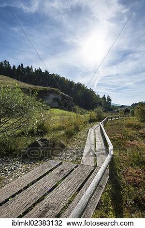 "Reconstructed moorland region with a wooden boardwalk at Petersfels rock at the ice age park near Engen, Baden-Wuerttemberg, Germany, Europe" View Large Photo Image Stock Image - "Reconstructed moorland region with a wooden boardwalk at Petersfels rock at the ice age park near Engen, Baden-Wuerttemberg, Germany, Europe". Fotosearch