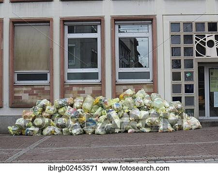 "Recycling bags, yellow bags, in front of a house, Freiburg, Baden-Wurttemberg, Germany, Europe" View Large Photo Image Stock Image - "Recycling bags, yellow bags, in front of a house, Freiburg, Baden-Wurttemberg, Germany, Europe". Fotosearch