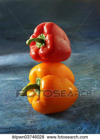 Stock Photo - Red and orange bell peppers. Fotosearch