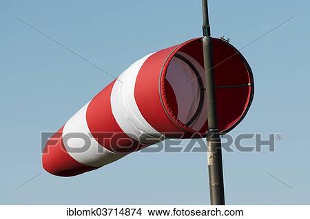 "Red and white windsock against a blue sky, Mykines, Mykines, Faroe Islands, Denmark, Europe" View Large Photo Image Picture - "Red and white windsock against a blue sky, Mykines, Mykines, Faroe Islands, Denmark, Europe". Fotosearch
