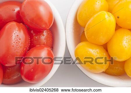 Red and yellow plum tomatoes View Large Photo Image Stock Photo - Red and yellow plum tomatoes. Fotosearch
