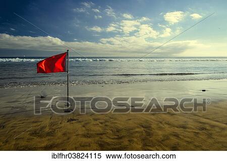 "Red bathing prohibition flag standing on a beach, Maspalomas, Canary Islands, Spain, Europe" View Large Photo Image Stock Photography - "Red bathing prohibition flag standing on a beach, Maspalomas, Canary Islands, Spain, Europe". Fotosearch