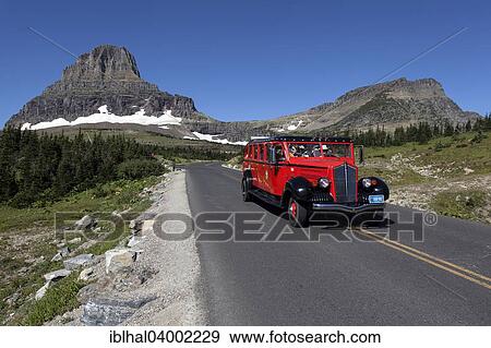 "Red Bus Tour on the Going-to-the-Sun Road at Logan Pass, Glacier National Park, Montana, United States, North America" View Large Photo Image Stock Photo - "Red Bus Tour on the Going-to-the-Sun Road at Logan Pass, Glacier National Park, Montana, United States, North America". Fotosearch