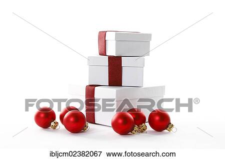 Red Christmas baubles and presents with red ribbons View Large Photo Image Stock Photo - Red Christmas baubles and presents with red ribbons. Fotosearch