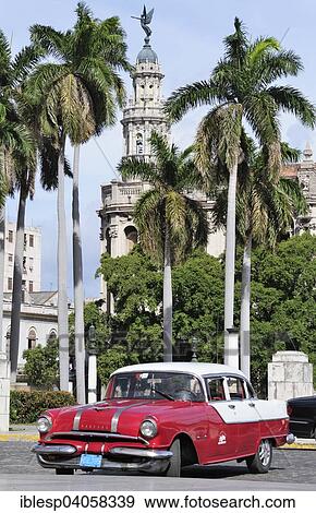 "Red classic car, Gran Teatro de La Habana, Great Theatre of Havana, Centro Habana, Havana, Ciudad de La Habana, Cuba, North America" View Large Photo Image Stock Photo - "Red classic car, Gran Teatro de La Habana, Great Theatre of Havana, Centro Habana, Havana, Ciudad de La Habana, Cuba, North America". Fotosearch