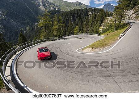"Red convertible travelling on the Maloja Pass, serpentines, winding road, near Sondrio, Lombardy, Italy, Europe" View Large Photo Image Stock Photo - "Red convertible travelling on the Maloja Pass, serpentines, winding road, near Sondrio, Lombardy, Italy, Europe". Fotosearch