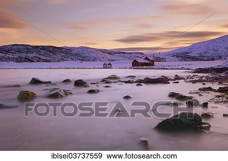"Red fishing hut before fjord in winter landscape, Sommeroya, Tromso, ‪Troms, Northern Norway, Norway, Europe" View Large Photo Image Stock Photo - "Red fishing hut before fjord in winter landscape, Sommeroya, Tromso, ‪Troms, Northern Norway, Norway, Europe". Fotosearch