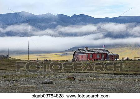 Stock Photo - "Red house, Doubtful Village, Doubtful Village, Wrangel Island, Far Eastern Federal District, Russia, Europe". Fotosearch