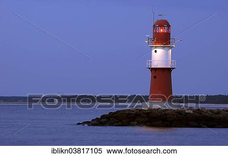 "Red lighthouse at dusk, harbour, Warnemunde, Mecklenburg-Vorpommern, Germany, Europe" View Large Photo Image Stock Photography - "Red lighthouse at dusk, harbour, Warnemunde, Mecklenburg-Vorpommern, Germany, Europe". Fotosearch