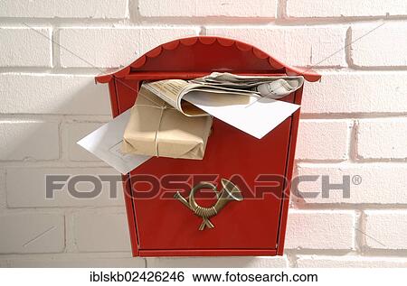 Red mailbox stuffed with letters and parcels View Large Photo Image Stock Photograph - Red mailbox stuffed with letters and parcels. Fotosearch