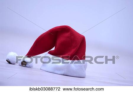 Red Santa Claus hat with bells View Large Photo Image Stock Image - Red Santa Claus hat with bells. Fotosearch