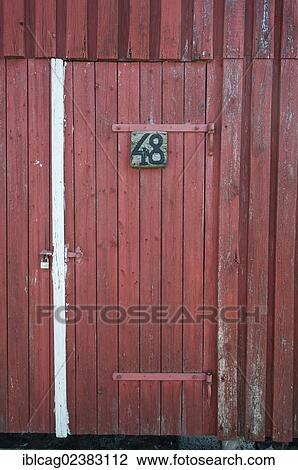 "Red wooden door with a padlock and a wooden sign, number 48" View Large Photo Image Stock Image - "Red wooden door with a padlock and a wooden sign, number 48". Fotosearch