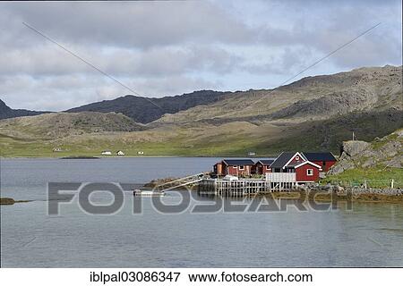 "Red wooden houses on the coast, Barents Sea, Porsangenfjord, Norway, Europe" View Large Photo Image Stock Photo - "Red wooden houses on the coast, Barents Sea, Porsangenfjord, Norway, Europe". Fotosearch