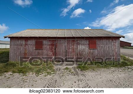 "Red wooden shed, harbour of Hvide Sande, western Jutland, Denmark, Europe" View Large Photo Image Stock Image - "Red wooden shed, harbour of Hvide Sande, western Jutland, Denmark, Europe". Fotosearch